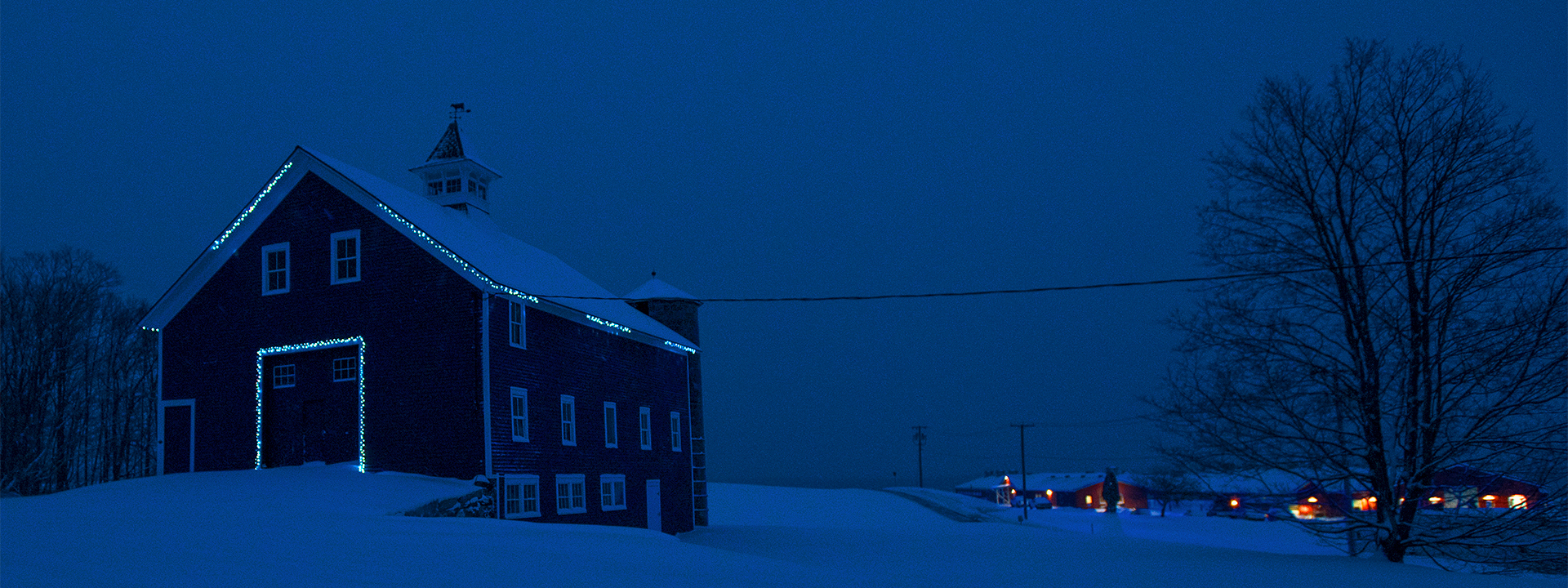 snow barn at night